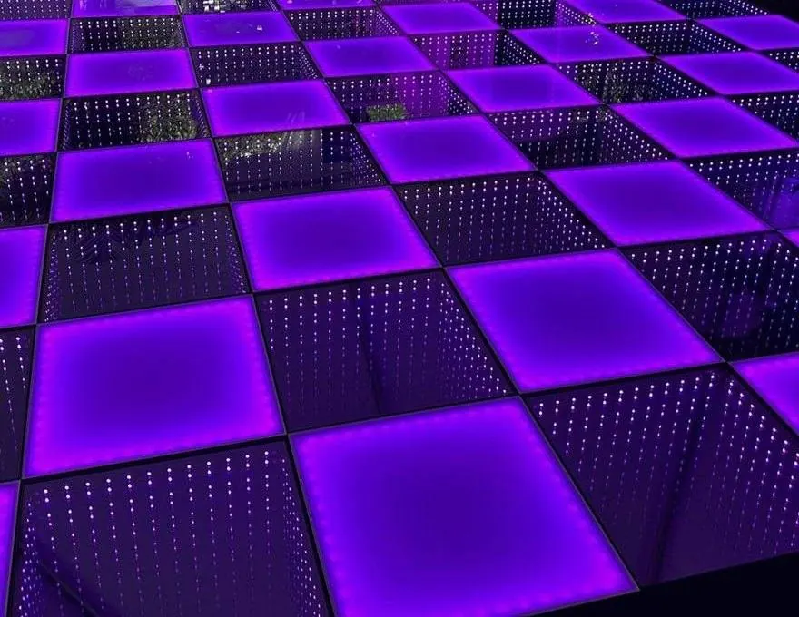 Purple checkered frosted and infinity LED dance floor at a 40th birthday party